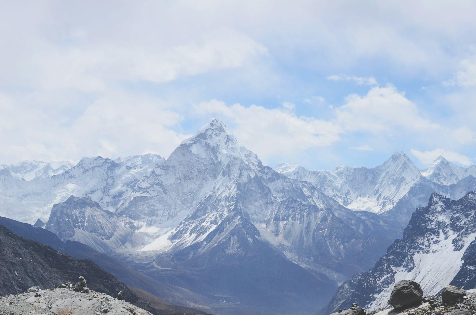 Snow-covered mountain peaks under a clear sky